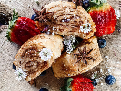 gluten free roll and fruit on serving board