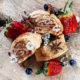 gluten free roll and fruit on serving board