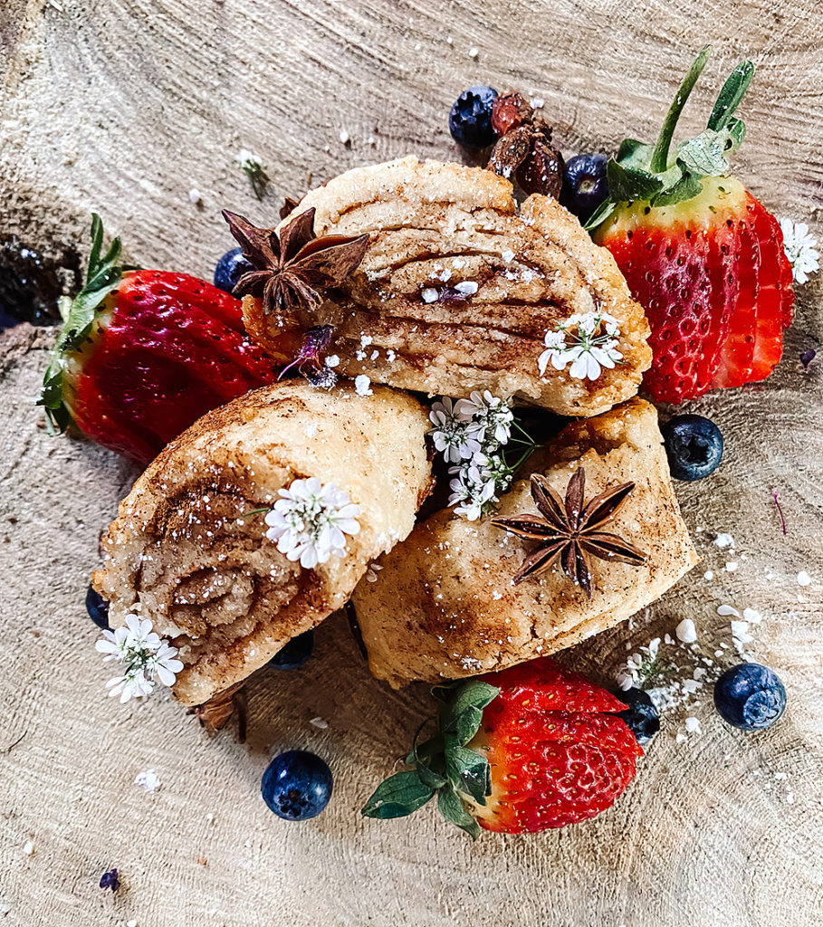 gluten free roll and fruit on serving board